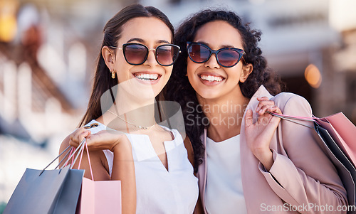 Image of Happy, shopping bag or friends with luxury fashion in a city for clothing products on sale deals or discount offers. Paris, smile or excited women walking on a fun girls trip on holiday vacation