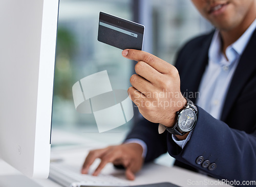 Image of Business man, hands and credit card for ecommerce, check investments and make payments in office. Pc, male and ceo with finance transactions, banking and online shopping with fintech and budget.