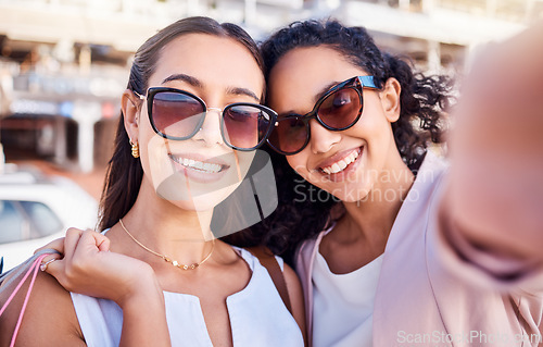 Image of Selfie, women or friends shopping in city, smile or wealth for luxury clothes, boutique or sale. Customers, ladies or girls with bags, sunglasses or clients with social media, rich or happy in street