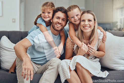 Image of Happy family, bonding parents or children hug in Canada house or home living room in trust, relax support or love security. Portrait, smile or kids with mother, father or man and woman embrace