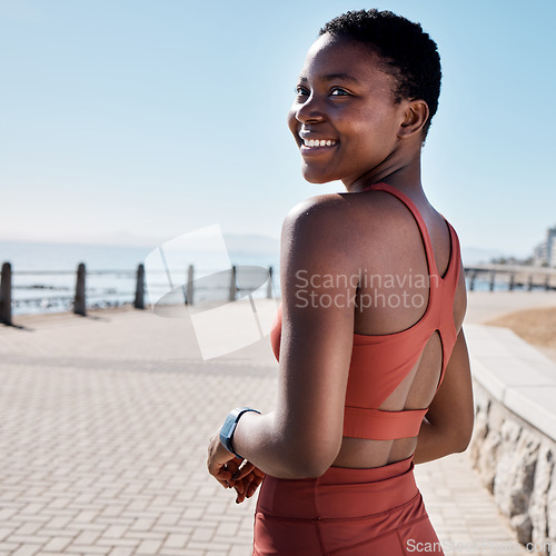 Image of Black woman, fitness or happy runner thinking of training goals, exercise or cardio workout targets in summer. Smile, wellness or healthy African sports girl at a beach for running, jog or exercising