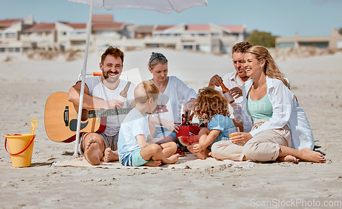 Image of Summer, picnic and family with guitar at beach enjoying holiday, weekend and vacation on Miami beach. Love, bonding and children with grandparents, mom and dad with musical entertainment outdoors