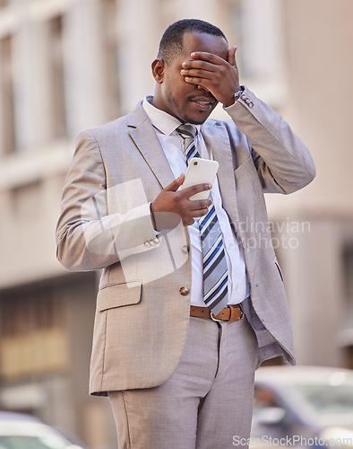 Image of Facepalm, phone and city with a business black man in shock after reading a text message outdoor during his commute. Unhappy, doubt and face palm with a male employee shocked in an urban town