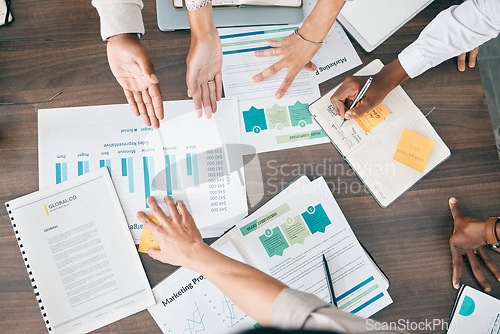 Image of Collaboration, documents and financial with a business team working together in an accounting office from above. Meeting, data and finance planning with a man and woman accountant group at work