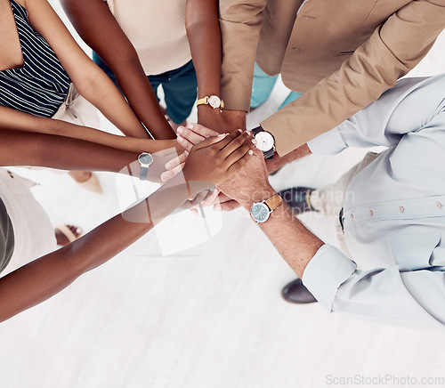 Image of Teamwork, support and stack of hands of business people for community, trust and collaboration in office. Diversity, motivation and hands together of group of workers for agreement, goals and growth