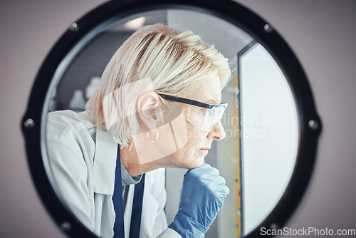 Image of Scientist, worker or laboratory autoclave equipment in medical research, vaccine temperature control or dna engineering. Zoom, thinking face or mature woman or science centrifuge machine for medicine