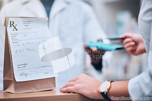 Image of Pharmacy, card machine and patient paying for the medication at medical clinic dispensary. Credit card, prescription medicine and closeup of payment with cash dispenser point at pharmaceutical store.