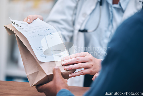 Image of Pharmacy, prescription medication and doctor hands with retail patient, shopping or healthcare product. Closeup, nurse or pharmacist with customer for health note, wellness pills and brown paper bag