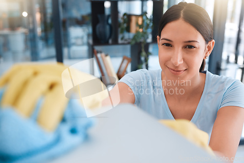 Image of Hand, woman and table cleaning for hygiene, housework and household cleansing in an apartment. Hands, girl and clean product for dust, dirt and germs, bacteria and illness prevention on surface