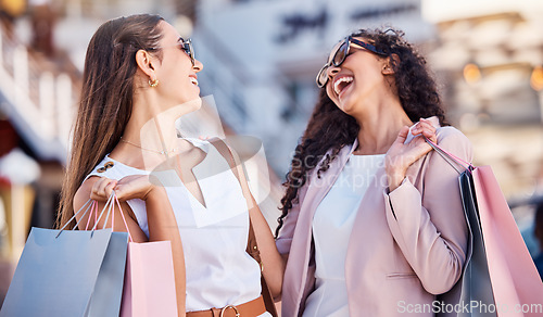 Image of Shopping, happy and women with bags in the city together for a luxury sale, discount or promotion. Happiness, rich and fancy girl friends on shopping spree for fashion, boutique and expensive clothes