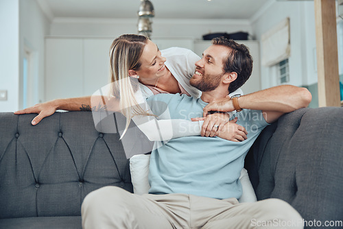 Image of Love, relax or couple hug in house living room sofa and resting on a holiday vacation with support in a happy marriage. Smile, Berlin or happy woman enjoying quality bonding time with a fun partner