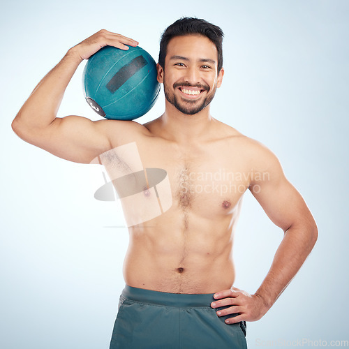 Image of Man, body or medicine ball on studio background for fitness workout, training or exercise for healthcare wellness, muscle growth or goals. Portrait, smile or happy bodybuilder with weight motivation