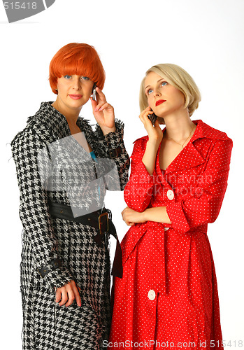 Image of attractive young women calling by cellular phone.
