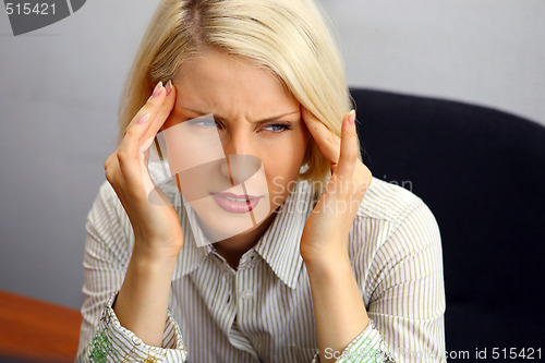 Image of Woman with severe Headache (Migraine). 