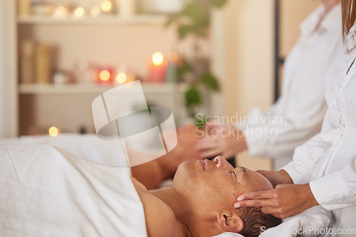 Image of Massage, reiki and couple at spa with therapist hand, chakra balance with wellness, spiritual and self care. Peace, zen and luxury service with masseuse, relax and mental health break holiday in Bali
