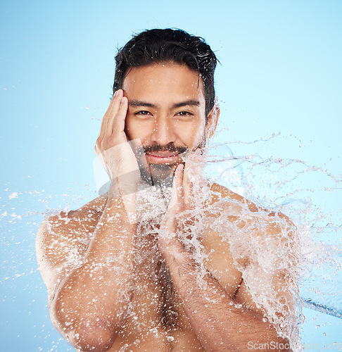 Image of Portrait, water splash or man in shower in studio cleaning his face or body for beauty, skincare or self love. Wellness, luxury or healthy male model washing body in natural grooming morning routine