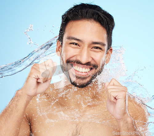 Image of Dental, teeth floss and water splash with man in portrait for hygiene, cleaning and oral healthcare against studio background. Teeth whitening, clean mouth and fresh breath with smile and Invisalign