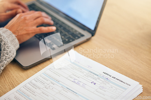 Image of Woman, hands and laptop for medical documents, healthcare insurance and typing hospital email communication online. Patient results, clinic paperwork and planning financial payment on tech device