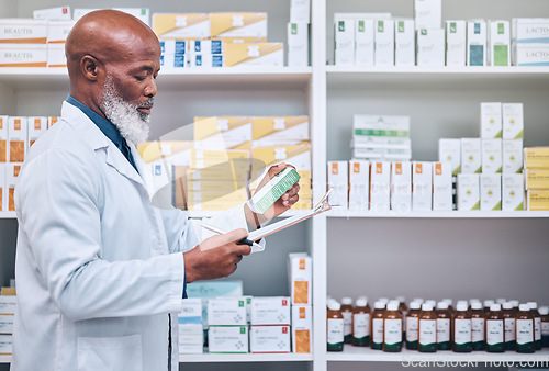 Image of Black man pharmacist, checklist for pills in pharmacy and health, medicine inventory or fill up prescription in medical store. Healthcare, chemist with clipboard and black man does stock check.