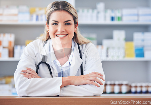 Image of Woman, portrait or happy pharmacist with working or helping with medical advice in pharmacy or wellness clinic. Face, doctor or healthcare worker smiles with pride or goals in retail drugstore shop