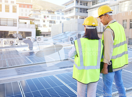 Image of Engineer, back or woman with man, solar energy or sustainable power inspection. Technician, male or female for panels maintenance, eco friendly construction or agriculture for alternative electricity