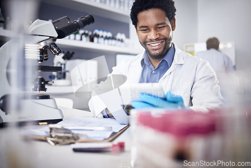 Image of Scientist, research and black man with tablet, laboratory and innovation for healthcare, online schedule or tech. African American male, researcher and digital planning for medical diagnosis and cure