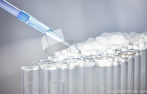 Image of Science, test tubes and syringe for research, experiment or project in chemistry laboratory. Glass vials, innovation and chemical liquid for scientific innovation or analysis in a pharmaceutical lab.