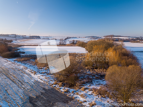 Image of Winter landscape with frozen pond covered with snow. Czech Republic, Europe