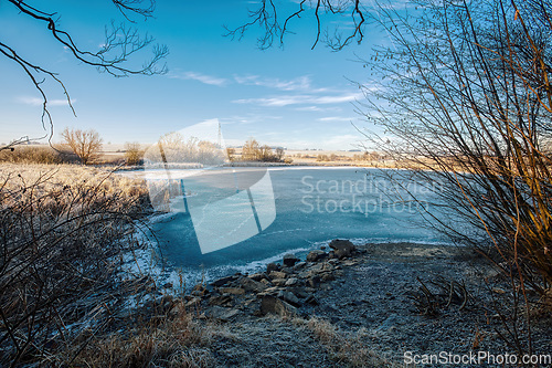 Image of Beautiful winter rural landscape with pond