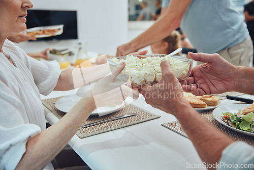 Image of Hands, lunch and potato salad in family home for healthy food, celebration or people in dining room. Family, dinner and party for food, salad plate or helping hand at table for nutrition to celebrate