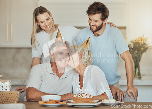 Image of Birthday, family and senior parents with cake for party, celebration and festive event in home. Happy, smile and elderly mother, father and couple with dessert, decoration and celebrate for love