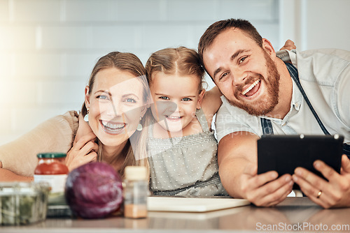 Image of Happy family, cooking and parents with child in a kitchen to prepare a meal with online recipe in a home together. Bonding, smile and portrait of kid hug mother and father in a house with food
