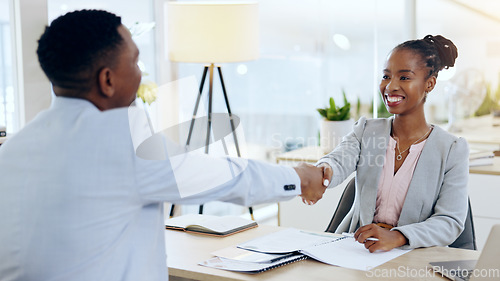 Image of African man, woman and handshake at interview, recruitment and hiring with agreement for job in office. Human resource expert, black business owner or manager with smile, shaking hands and onboarding