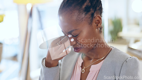 Image of Black woman, headache and business stress from mistake, debt or financial crisis in burnout at office. Frustrated African female person employee in pain, anxiety or depression for fail at workplace