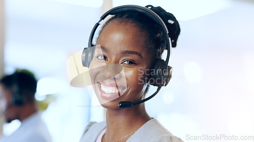 Image of Portrait, call center and happy black woman in telemarketing, support and help desk in office. Customer service, sales agent and face of African consultant, business professional and smile in Nigeria