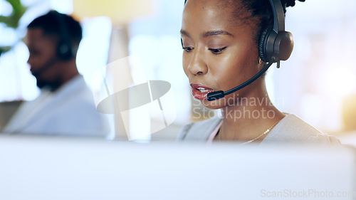 Image of Call center, computer and black woman talk for telemarketing, support or contact us at help desk in office. Customer service, sales agent and African consultant in communication, crm and business