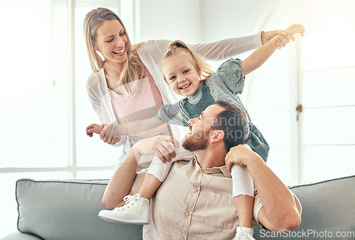 Image of Airplane, fantasy and parents playing with child on a couch in a home together and bonding as a family with love. Care, happiness and kid happy with mother and father on a sofa for fun