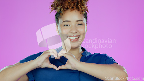 Image of Heart, hands and portrait, woman with love sign and romance, care and support isolated on pink background. Health, wellness and charity with emoji or hand gesture in studio, feedback or review