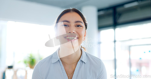 Image of Happy, portrait and business woman in the office with confident, good and positive attitude. Smile, pride and headshot of professional young female lawyer from Canada standing in modern workplace.