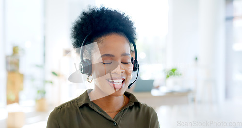 Image of Black woman at callcenter, phone call and CRM with contact us and customer service job. Telemarketing, help desk and advice with receptionist or consultant in conversation, telecom and communication
