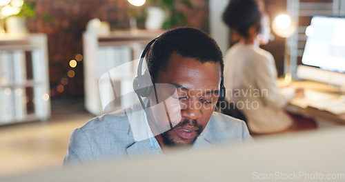 Image of African man, call center and computer in thinking, talk or night for telemarketing, voip mic or contact us. Consultant, crm and tech support agent for customer service, idea or questions at help desk