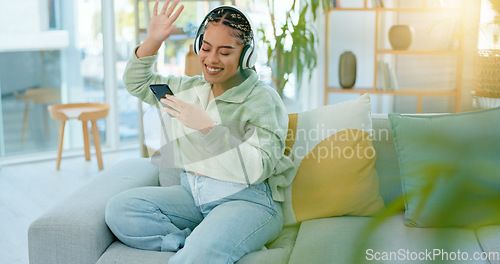 Image of Woman, wave and headset on video call in living room with people, friends or family from holiday to Bali. African, person and happy on face, smile or excited with telecom on internet, app or web