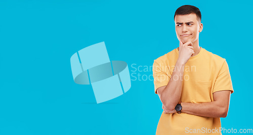 Image of Thinking, inspiration and ideas, confused man in studio with future or solution on blue background. Why, question with problem solving and remember, mockup space with insight and memory or doubt