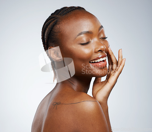 Image of Happy black woman, natural skincare or wellness in studio with a smooth shine, smile or glow. Beauty, clean detox or confident African girl model with pride or dermatology results on white background