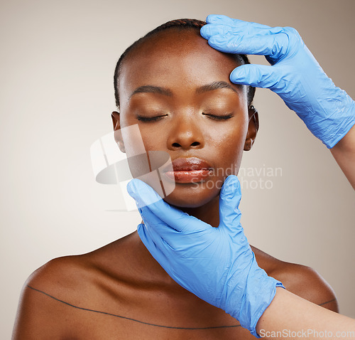 Image of Portrait, hands and botox with a black woman patient in studio on a gray background for cosmetic change. Face, beauty and transformation with a young model getting ready for plastic surgery treatment