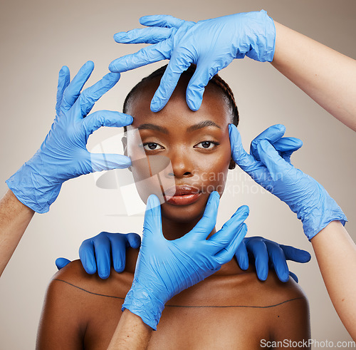 Image of Portrait, hands and plastic surgery for change with a black woman patient in studio on a gray background for cosmetics. Face, beauty transformation and a young model getting ready for botox treatment