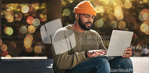Image of Student, man and computer at outdoor campus for university, college and scholarship research or studying in park. African person on laptop streaming for online education, website or e learning banner