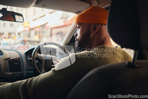 Image of Driving, travel and man in a car for transportation, location search and in traffic in the morning. Thinking, driver and a person on a journey in transport for a commute or parking in the street