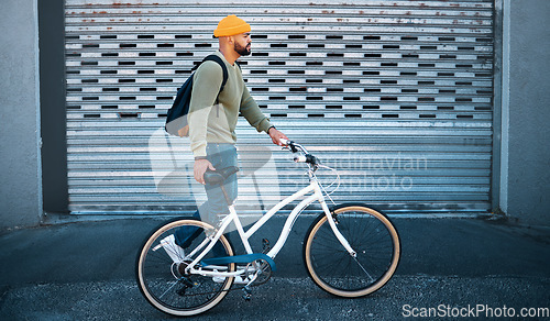 Image of City, walking and man with bicycle for eco friendly transport to university in morning street. Urban sidewalk, carbon neutral commute and college student with bike, backpack and sustainable travel.