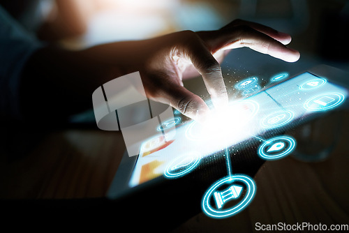 Image of Person, hand and tablet at night with hologram, UI or 3D HUD and dashboard with icons on desk at office. Closeup of employee working late on technology in digital marketing or networking at workplace